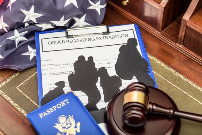 An order regarding extradition, a gavel, a U.S. passport, and an American flag, representing legal proceedings related to immigration enforcement.