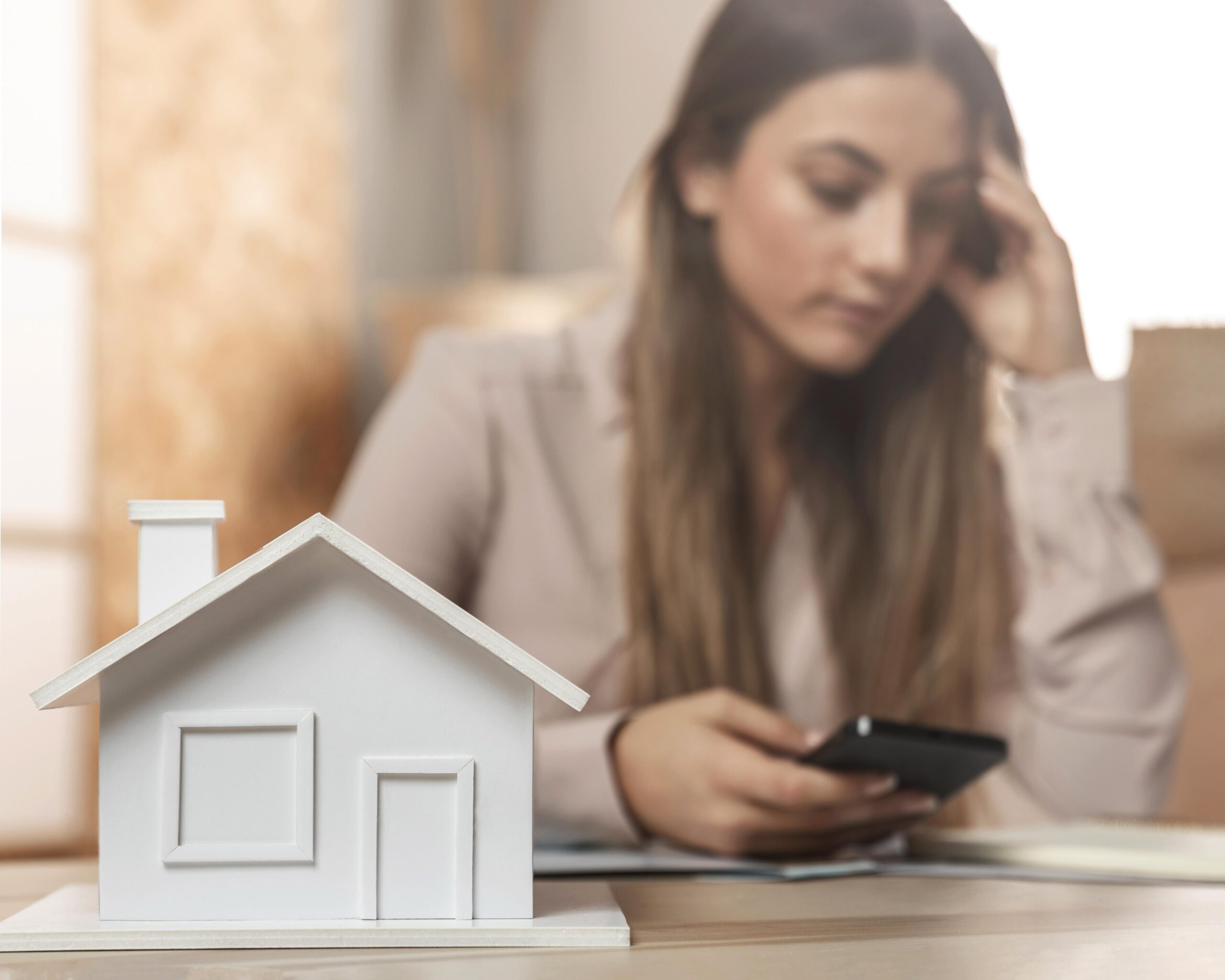 Woman tenant worried about privacy and tenant rights in California rental property.