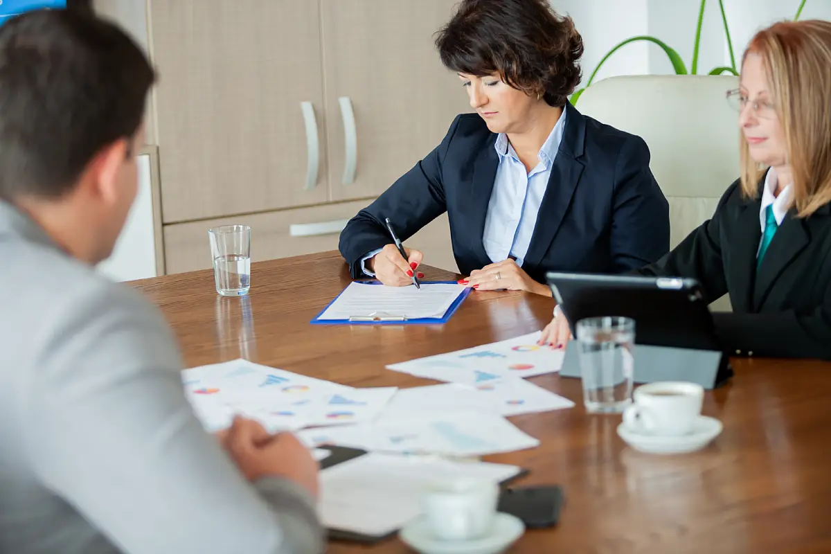 tenant signing legal documents during landlord lawsuit process